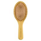 Wooden hairbrush with rounded bristles and AVA Skincare engraved on the handle.