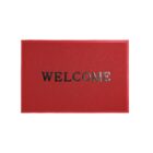 Red doormat with the word WELCOME in bold black letters.