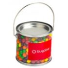 Clear bucket filled with colorful candies and a metal handle, labeled with bugaba.
