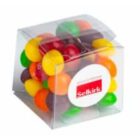 A clear plastic box filled with colorful candies, labeled with a red and white Selkirk sticker.