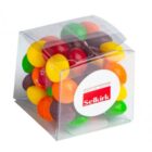 A clear box filled with colorful candy-coated sweets and labeled Selkirk on the front.