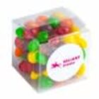 A clear cube filled with colorful jelly beans.