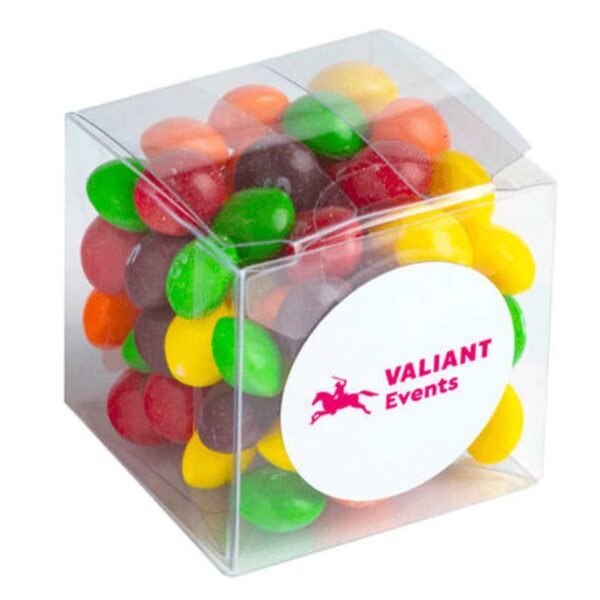 Clear box filled with colorful candy-coated sweets, labeled VALIANT Events on the front.