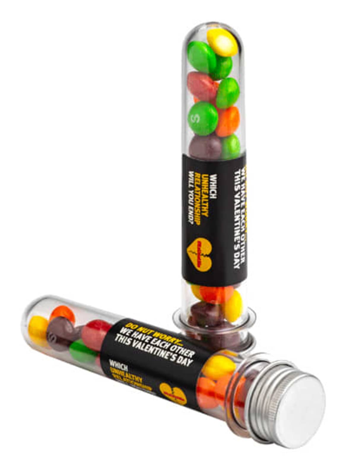 Candy-filled test tubes with Valentines Day labels, containing colorful Skittles candies.