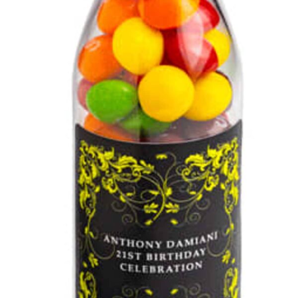 A clear bottle with colorful candy and a custom 21st birthday celebration label.