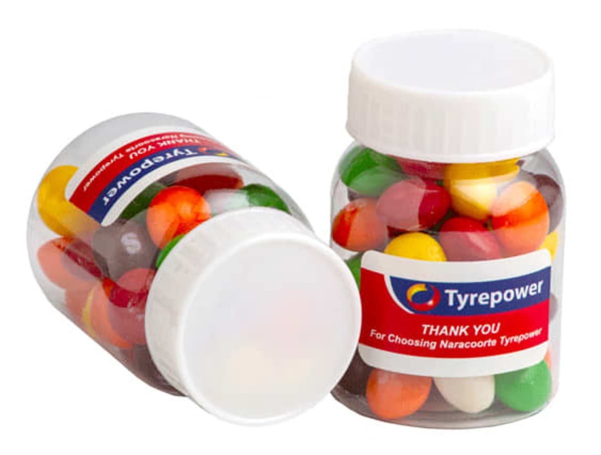 Two jars filled with colorful candy, each labeled with a Tyrepower logo and thank you message.