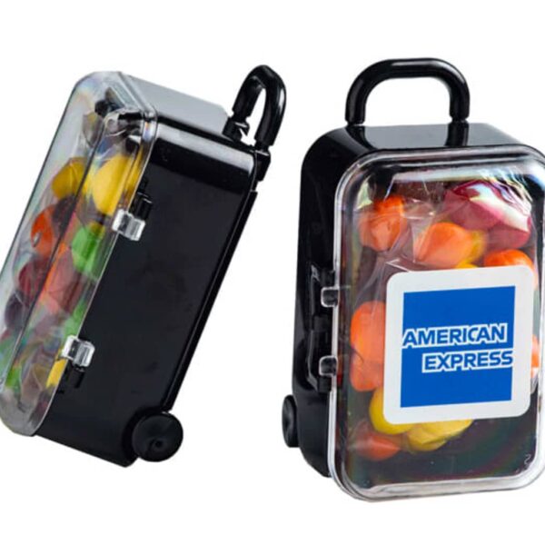 Two mini luggage cases with wheels, filled with colorful candy, labeled American Express.