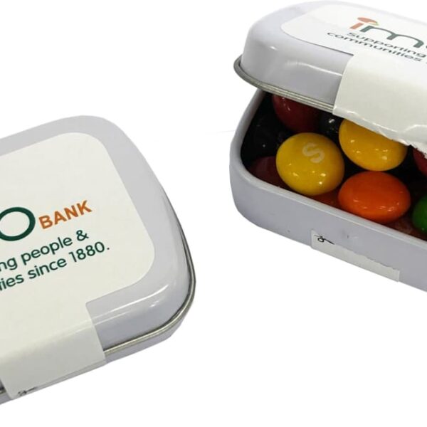Two small tins with IMB Bank logo, one open showing colorful candy inside.