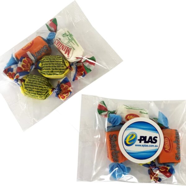 Two clear plastic packets each containing colorful wrapped candies.