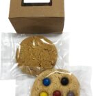 Two packaged cookies and a brown box with a Bendigo TAFE logo on top.
