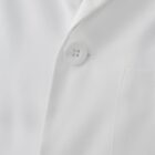 Close-up of a white lab coat with buttons and a pocket.