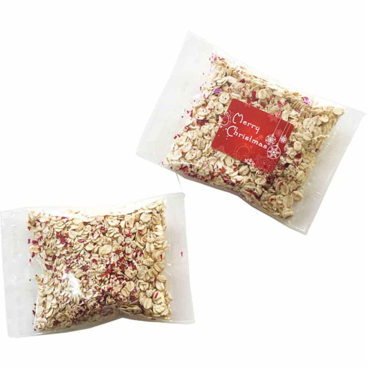 Two clear bags of oats with red sprinkles, one labeled Merry Christmas.