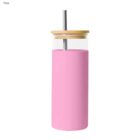 Pink tumbler with a bamboo lid and metal straw.