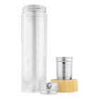 Clear glass bottle with a metal infuser and bamboo coaster on a white background.