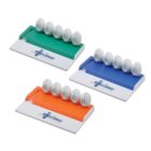Three desk organizers in green, blue, and orange with slots and logo on white base.