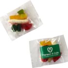 Two clear packets of assorted gummy candies, one labeled Hansen & Cole.