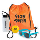 Orange drawstring bag, water bottle, yellow ball, and blue sunglasses with Playtopia branding.