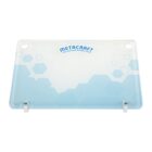 Transparent cutting board with blue hexagons and Metacraft logo on top.
