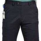 Person wearing black cargo shorts with an ID badge attached.