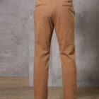 Man wearing brown trousers with a brown belt, viewed from the back.