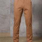 A person wearing brown pants, brown belt, and brown shoes.