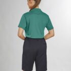 A person in a green polo and black shorts, viewed from the back.