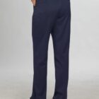 Person wearing navy pants and white shoes, standing on a light background, facing away.