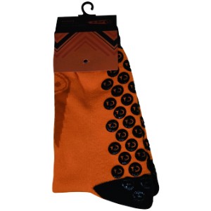 Variety-rich orange socks, black grip soles, on a sleek black hanger.