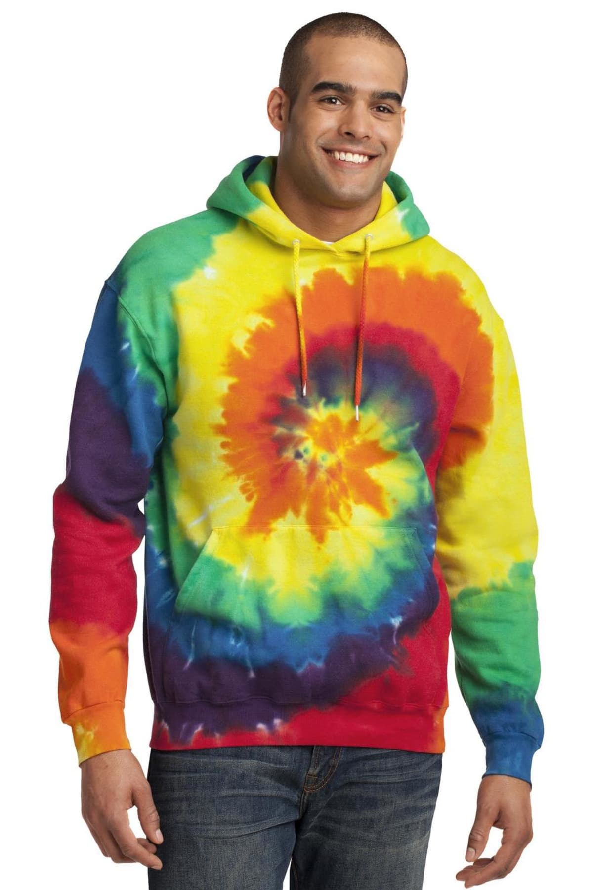 Person smiling in a colorful tie-dye hoodie with hands by side.