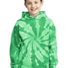 Smiling child in a green tie-dye hoodie and jeans.