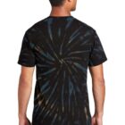 Man wearing a black tie-dye t-shirt with jeans, viewed from the back.