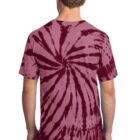 Man wearing a maroon tie-dye T-shirt with a spiral pattern, viewed from the back.
