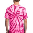 Person in pink tie-dye shirt facing away, showing spiral pattern.
