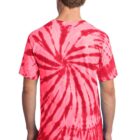 Person seen from behind wearing a pink and red tie-dye shirt.