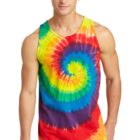 Person in rainbow tie-dye tank top and jeans, standing against a white background.