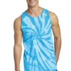 Person wearing a blue tie-dye tank top and jeans, smiling.