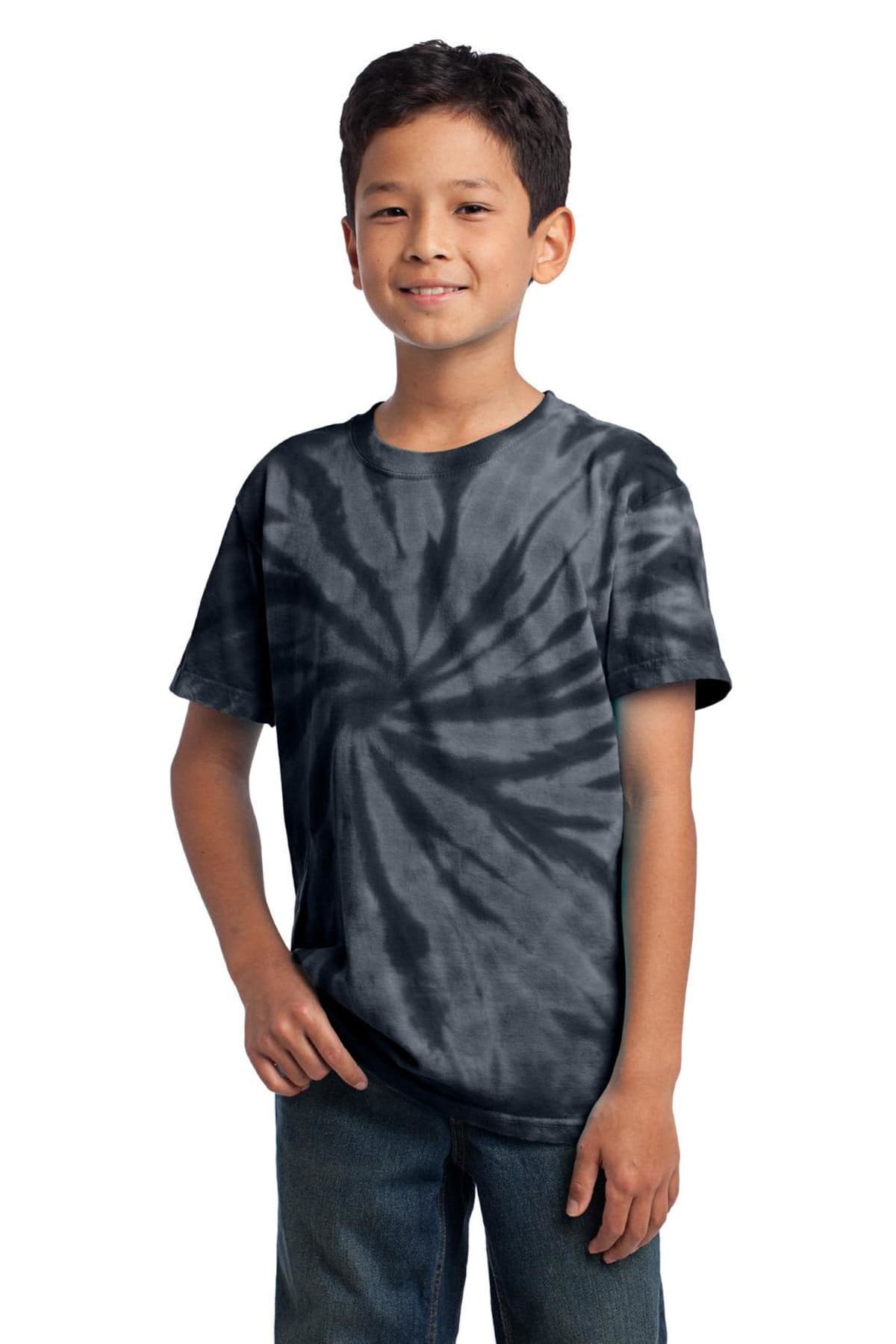 Boy in a black tie-dye shirt and jeans posing casually, smiling.
