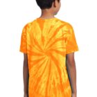 Boy wearing orange tie-dye shirt and jeans, facing away.