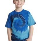 Smiling boy in a blue tie-dye T-shirt and jeans.