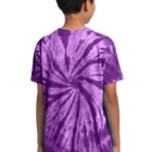 Boy in a purple tie-dye t-shirt and jeans, facing away.