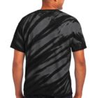 Man wearing a black tie-dye T-shirt facing away from the camera.