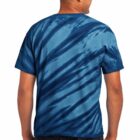 Person wearing a blue tie-dye shirt and jeans, viewed from the back.