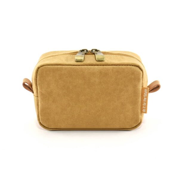 Tan rectangular toiletry bag with zipper and side handles against a white background.