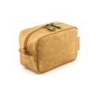 Small rectangular tan fabric pouch with a zipper and a side handle.