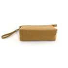 Tan rectangular pouch with a wrist strap, shown from the bottom angle on a white background.