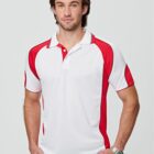 Man wearing a white and red polo shirt standing against a plain background.