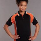 Child smiling in a black and orange sports shirt, hands on hips.