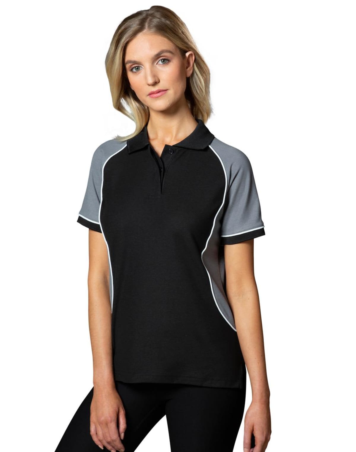 A person wearing a black and gray polo shirt against a white background.