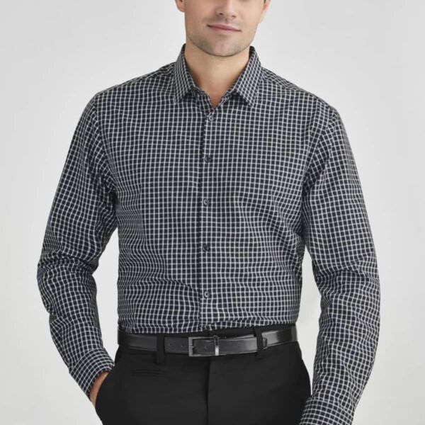 Man in black-and-white checkered shirt and black pants, standing with a neutral expression.