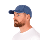 Man with a brown beard wearing a blue denim cap and white t-shirt, shown in profile.